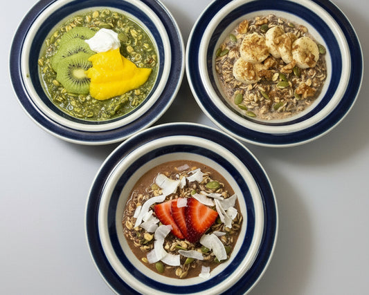 Dr. Mak's organic overnight oats in bowls with fresh fruit toppings