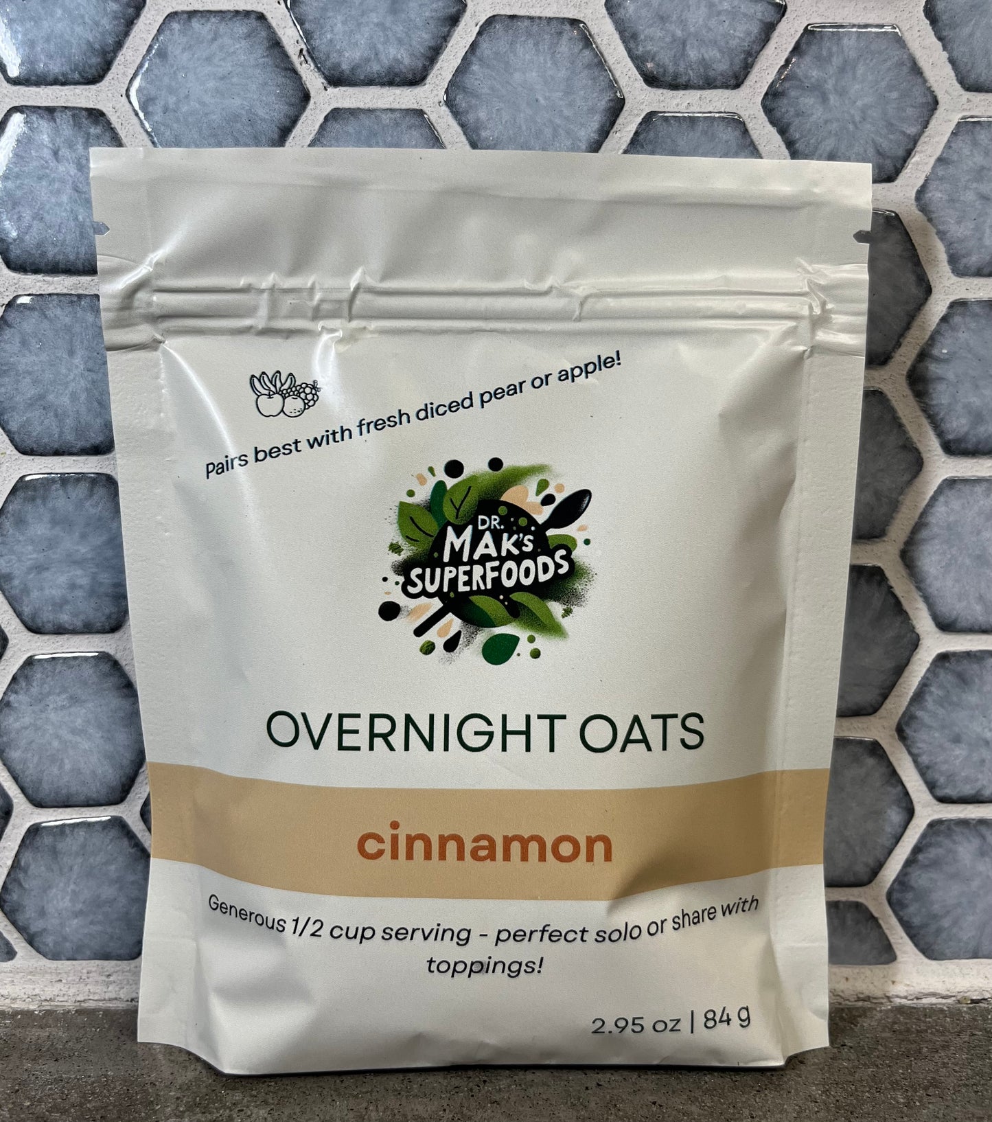 Package of Dr. Max's Superfoods Overnight Oats cinnamon flavor on a tiled background